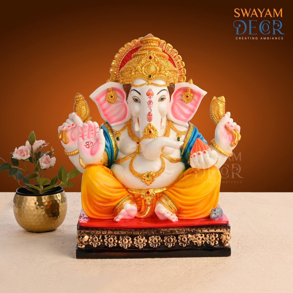 Ganesha Figurine with Chakra