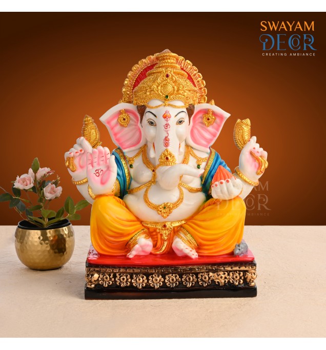 Ganesha Figurine with Chakra